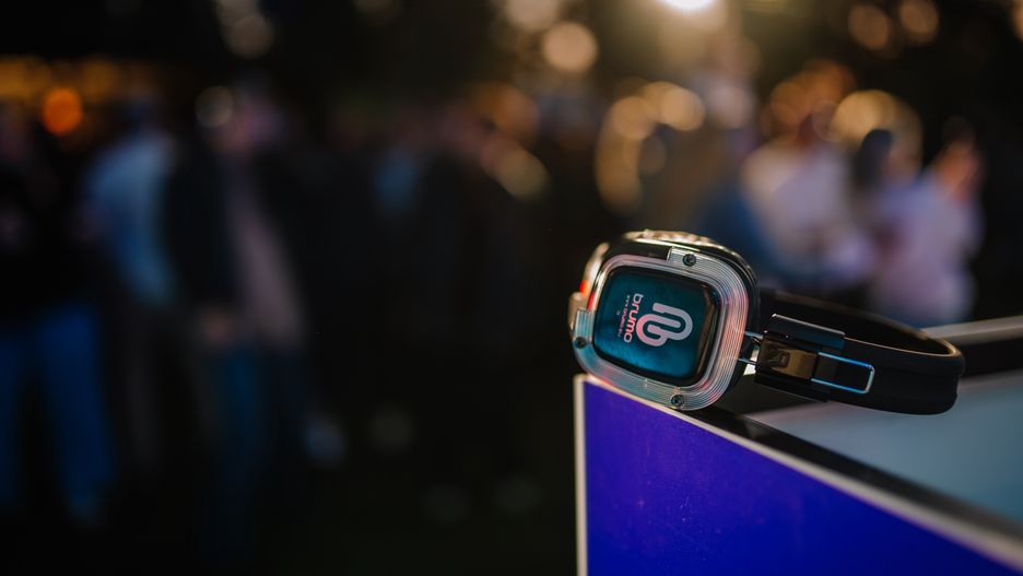 Cesis, Latvia - June 20, 2025 - Close-up of wireless headphones resting on a surface at a silent disco, with a blurred background of dancing people and bright lights in the distance.
RAIVO SARELAINENS
DJ, Fun, audio, background, black, blurred, brand, celebration, colorful, communication, cool, crowd, culture, dance, design, disco, electronics, energy, entertainment, equipment, event, festival, focus, headphones, illuminated, lifestyle, light, listening, modern, music, neon, night, nightlife, nightscape, outdoor, party, people, performance, silent, social, sound, technology, trendy, vibrant, wireless, youth, dj, fun, audio, background, black, blurred, brand, celebration, colorful, communication, cool, crowd, culture, dance, design, disco, electronics, energy, entertainment, equipment, event, festival, focus, headphones, illuminated, lifestyle, light, listening, modern, music, neon, night, nightlife, nightscape, outdoor, party, people, performance, silent, social, sound, technology, trendy, vibrant, wireless, youth