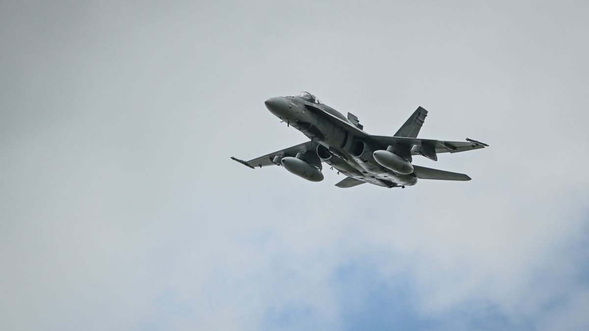 BRUCE, CANADA  JULY 27:A CF-188 Hornet, the Royal Canadian Air Force's multi-role fighter aircraft, soars overhead during the 2025 Bruce Stampede in Bruce, Alberta, Canada, on July 7, 2025. (Photo by Artur Widak/NurPhoto via Getty Images)