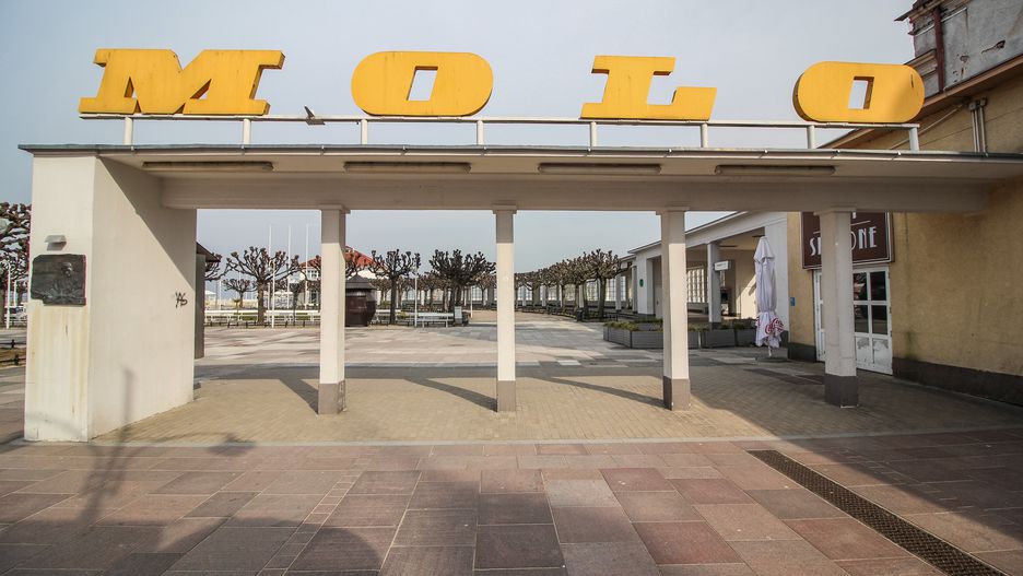 Completely empty entrance to the longest in Europe wooden Pier (Molo w Sopocie) is seen in Sopot, Poland on 27 March 2020  Polish government due the Covid-19 danger, forced ban on gatherings of more than 2 people and a ban on leaving home without apparent reason, as for instance going to job, to the pharmacy or for a dog walking. (Photo by Michal Fludra/NurPhoto via Getty Images)