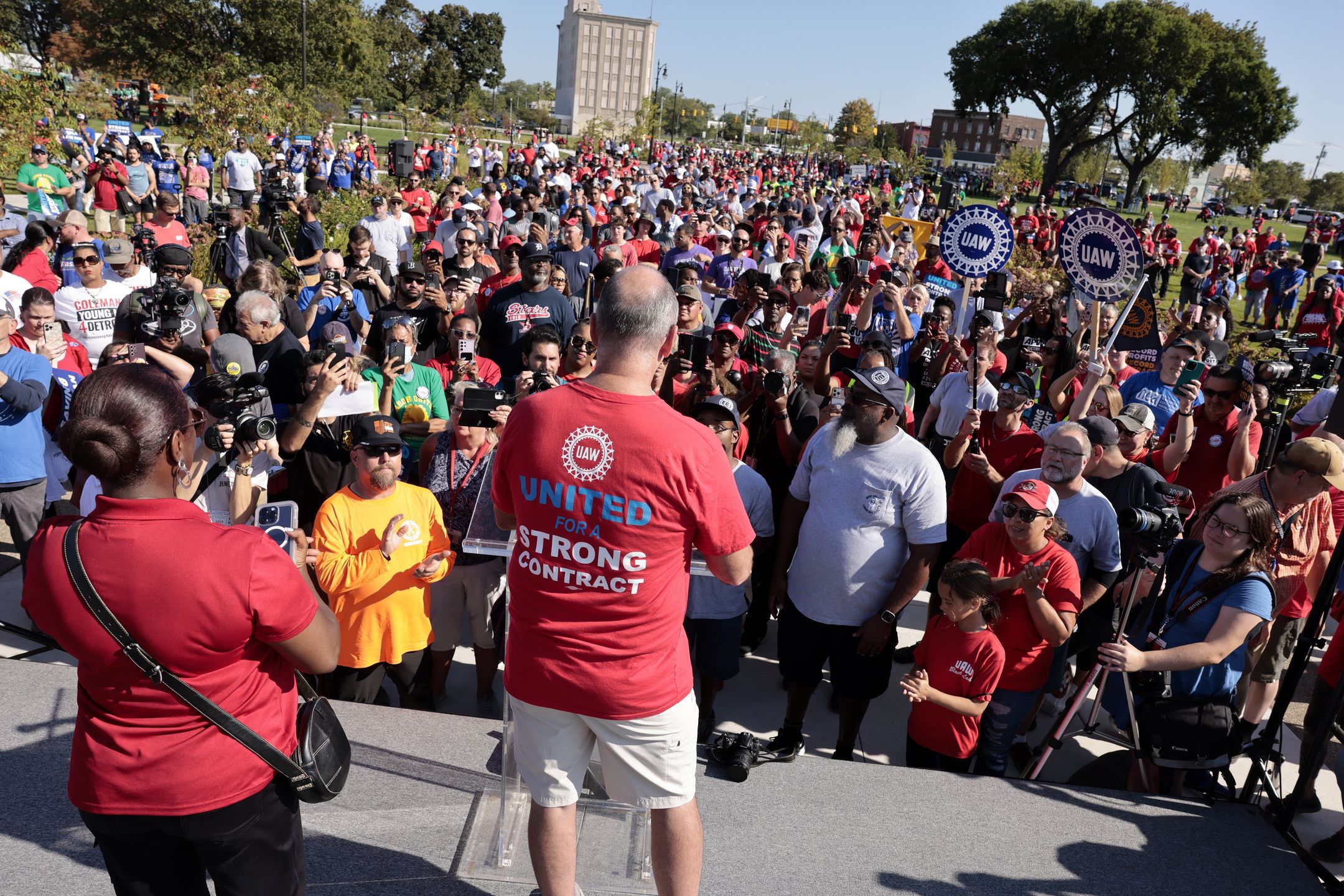 Shawn Fain, president of the United Auto Workers (UAW), speaks during a Labor Day parade in Detroit, Michigan, US, on Monday, Sept. 4, 2023. The UAW's 150,000 members are threatening a strike on General Motors, Ford Motor Co. and Stellantis NV, maker of the Jeep and Chrysler brands, if a deal with Detroit's big three legacy carmakers is not reached by a September 14 deadline. Photographer: Jeff Kowalsky/Bloomberg via Getty Images