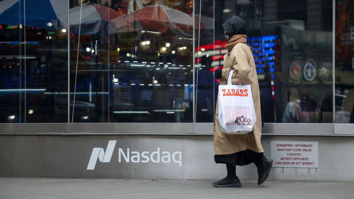 The Nasdaq MarketSite in New York, US, on Friday, March 27, 2026. Wall Street traders drove stocks lower ahead of the weekend on concern that a protracted war in Iran will keep oil prices elevated, fueling a simultaneous increase in inflation and a slowdown in growth. Photographer: Michael Nagle/Bloomberg via Getty Images