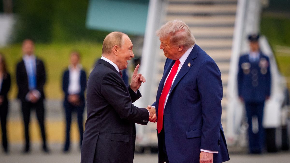 ANCHORAGE, ALASKA - AUGUST 15: U.S. President Donald Trump (R) greets Russian President Vladimir Putin as he arrives at Joint Base Elmendorf-Richardson on August 15, 2025 in Anchorage, Alaska. The two leaders are meeting for peace talks aimed at ending the war in Ukraine. (Photo by Andrew Harnik/Getty Images)