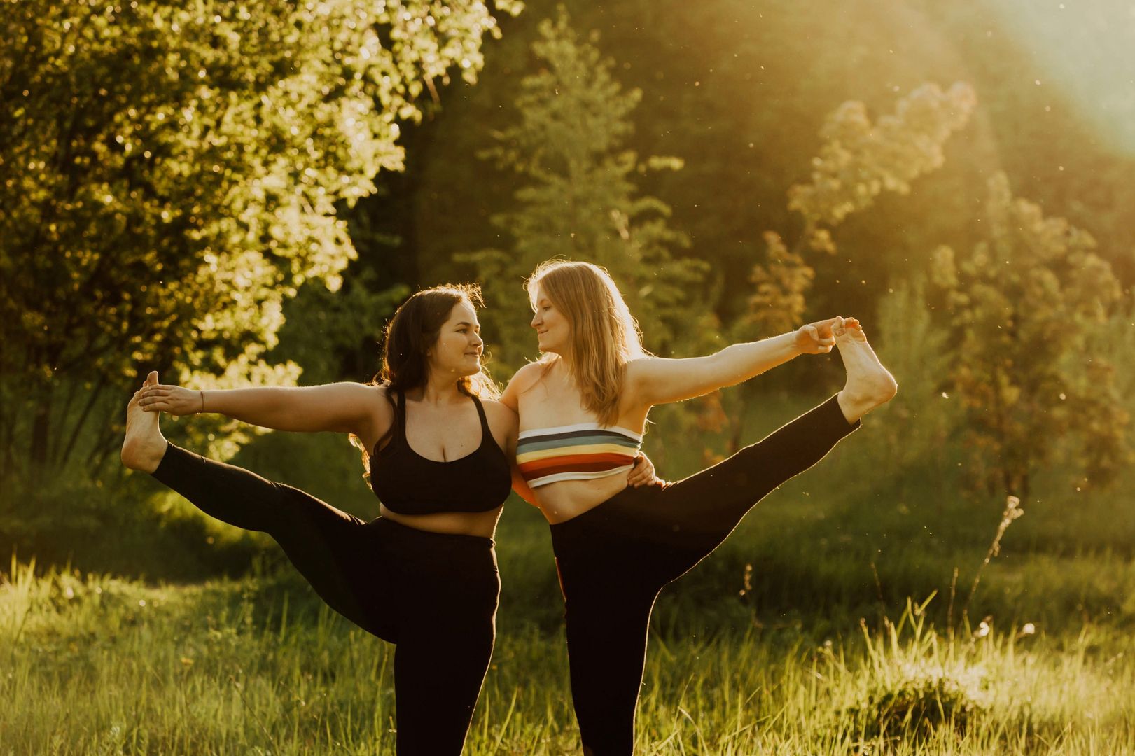 Two women with long hair doing yoga on a sunny day.
Two beautiful women with long hair doing yoga in nature on a sunny summer day. Body positive, sports for women and couple, harmony, asana, healthy lifestyle, inspiring look, self-love and wellness.
yoga, woman, fitness, asana, body positive, female, girl, body, health, healthy, lifestyle, people, relaxation, young, adult, beautiful, exercise, meditation, nature, pose, sport, fit, outdoor, park, summer, sunset, care, hands, slim, trees, beauty, concentration, balance, energy, relax, activity, athlete, brunette, clothing, pilates, practicing, sun rays, wellness, plus size, weight, friend, couple, together, curvy, long hair
