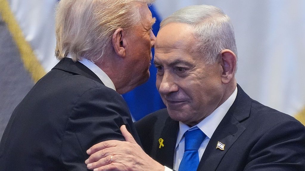 President Trump Visits Israel And Egypt After Gaza Ceasefire Takes Effect
JERUSALEM - OCTOBER 13: U.S. President Donald Trump talks with Israel's Prime Minister Benjamin Netanyahu in the Knesset, Israel's parliament, on October 13, 2025 in Jerusalem. President Trump is visiting the country hours after Hamas released the remaining Israeli hostages captured on Oct. 7, 2023, part of a US-brokered ceasefire deal to end the war in Gaza. (Photo by Evan Vucci - Pool/Getty Images)
Pool