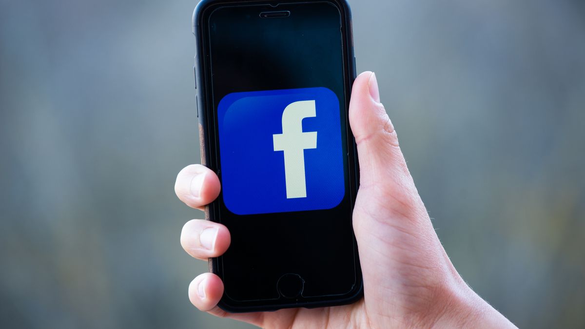 Logos of Facebook social media applications is displayed on the screen of an iPhone on February 20, 2023 in L'Aquila, Italy. Meta CEO Mark Zuckerberg announced the launch of a paid subscription starting at $11.99 per month for users to authenticate their profiles on Meta platforms (Facebook, Instagram). (Photo by Lorenzo Di Cola/NurPhoto via Getty Images)