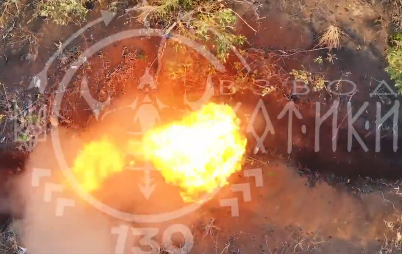 Footage of a napalm drop on a Russian trench.