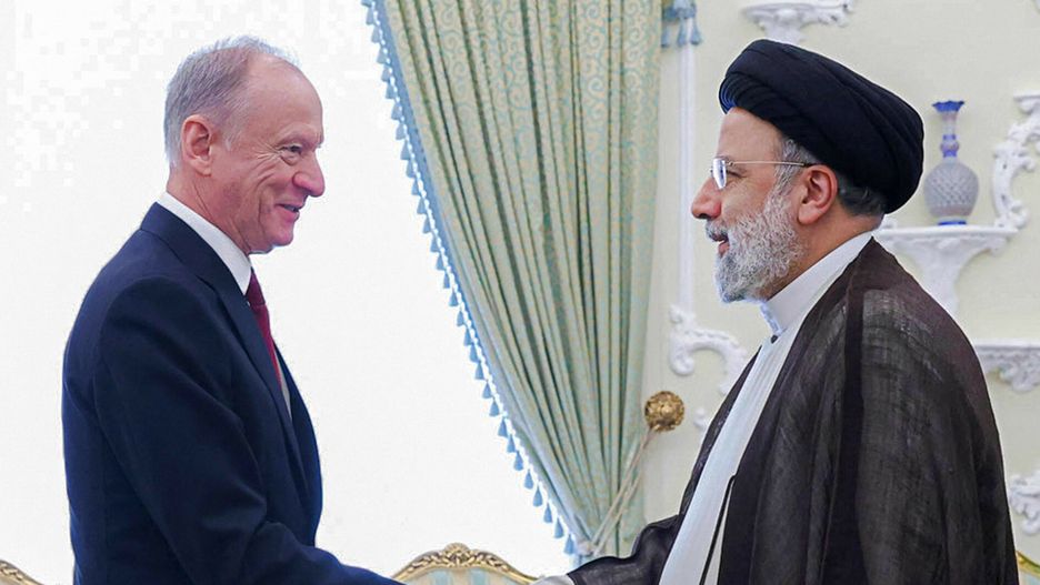 TemporaryThis handout picture provided by the Iranian presidential office shows Iran's President Ebrahim Raisi (R) receiving Russia's Secretary of the Security Council Nikolai Patrushev in Tehran on November 9, 2022. (Photo by IRANIAN PRESIDENCY / AFP) / === RESTRICTED TO EDITORIAL USE - MANDATORY CREDIT "AFP PHOTO / HO / IRANIAN PRESIDENCY" - NO MARKETING NO ADVERTISING CAMPAIGNS - DISTRIBUTED AS A SERVICE TO CLIENTS ===-