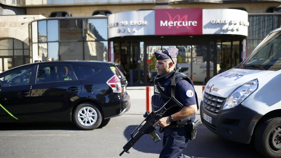 arch23A police officer runs to take position during a bomb scare at Gare de Lyon railway station in Paris, France, Friday, Sept. 9, 2016. A failed attack involving a car loaded with gas canisters near Notre Dame Cathedral was spearheaded by a group of women that included a 19-year-old whose written pledge of allegiance to the Islamic State group was found by police, a security official said Friday. (AP Photo/Francois Mori), APTOPIXAP
