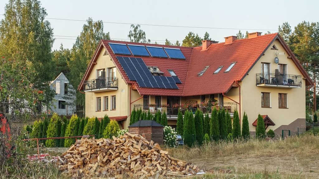 Summer In Wdzydze Kiszewskie
A pile of chopped wood collected for the winter in front of house with solar panels on the roof  is seen in Wdzydze Kiszewskie , Poland on 12 August 2022  (Photo by Michal Fludra/NurPhoto via Getty Images)
NurPhoto
wdzydze kiszewskie, chopped wood, solar panels, pile, front, roof, 12 august, photo, building, outdoor, home, property