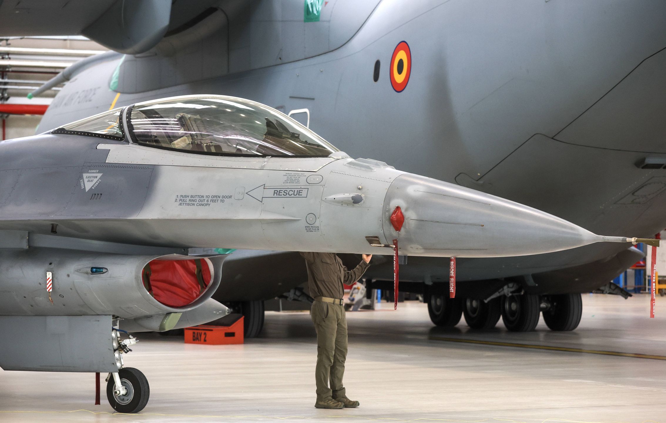 Ukraine's President Volodymyr Zelensky visits Belgium
epaselect epa11375167 A F-16 fighter aircraft is pictured ahead of the arrival of Ukraine's President Volodymyr Zelensky (not pictured) to attend a meeting with pilots, Belgian instructors and maintenance team of F-16 fighter aircraft at the Melsbroek military airport, in Brussels, Belgium, 28 May 2024. Zelensky visits Belgium to ink the latest in a string of security accords with Western allies. The two leaders discussed, among other things, Belgium's military support to Ukraine and the signing of a bilateral security agreement, including the supply of F-16 fighter jets as part of the security agreement.  EPA/OLIVIER HOSLET 
Dostawca: PAP/EPA.
OLIVIER HOSLET
epaselect