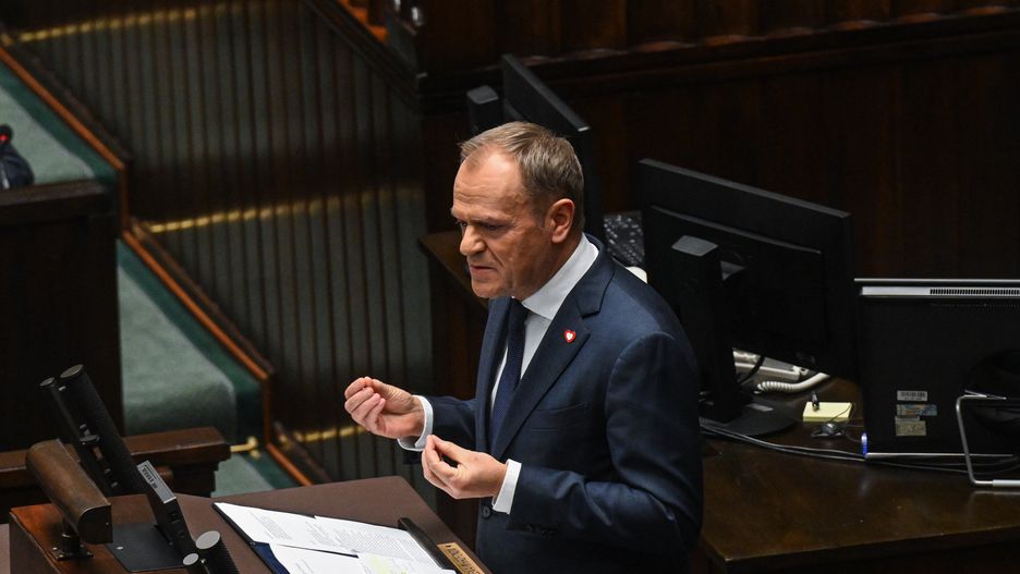 WARSAW, POLAND - DECEMBER 12: : The leader of Civic Coalition (KO), Donald Tusk delivers a speech ahead of the vote of confidence on his government cabinet during a session at the parliament (SEJM) on December 12, 2023 in Warsaw, Poland. on December 12, 2023 in Warsaw, Poland. After eight years of Poland's national conservative party in power, centrist Donald Tusk is back and set to forge a pro-EU government. (Photo by Omar Marques/Getty Images)