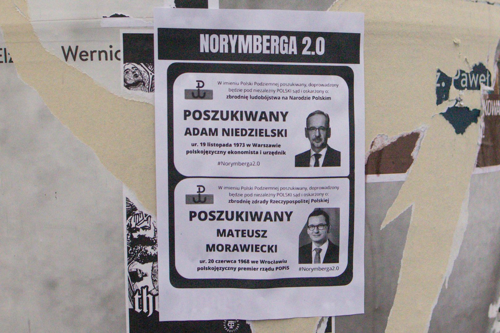 Norymberga 2.0 - projekt partii Grzegorza Brauna we Wroclawiu12.10.2021 Wroclaw: Norymberga 2.0 czyli projetk partii Grzegorza Brauna. Projekt Norymberga 2.0 ma na celu gromadzenie uzytecznych procesowo dowodow przestepstw i zbrodni popelnianych w zwiazku z Covid-19 przez partie PIS w Polsce. A nastepnie doprowadzenie ich autorow przed sad. We Wroclawiu na slupach w centrum miasta widnieja plakaty ze zdjeciami Premiera Mateusza Morawieckiego i Ministra Zdrowia Adama Niedzielskiego n/z plakaty Norymberga 2.0,Image: 637747506, License: Rights-managed, Restrictions: , Model Release: no, Credit line: Krzysztof Zatycki / ForumKrzysztof Zatycki / ForumAdam Niedzielski, Dolnyslask, Grzegorz Braun, List gonczy, Mateusz Morawiecki, Minister Zdrowia, Morawiecki, Niedzielski, Norymberga 2.0, Partia, PIS, Plakat, polityka, Polska, Premier, Ulica, Wroclaw