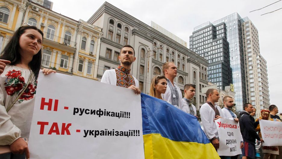 Ukrainian Far-right Activists Protest In KyivUkrainian far-right activists hold a placard reading like 'No - Russification! Yes - Ukrainization!', during a protest against consideration of a case on the constitutionality of the law about Ukrainian as the state language, near the Constitutional Court in Kyiv, Ukiraine, on 09 July, 2020. On 7 July, the Grand Chamber of the Constitutional Court of Ukraine began consideration of the case upon the constitutional petition of 51 Peoples Deputies of Ukraine on compliance with the Constitution of Ukraine of the Law of Ukraine &quot;On Ensuring the Functioning of the Ukrainian Language as the State Language&quot;.The petitioners claim that the disputed Law of Ukraine On Ensuring the Functioning of the Ukrainian Language as the State Language of April 25, 2019  2704  VIII is discriminatory against Russian-speaking citizens and certain linguistic minorities and indigenous peoples, the website of the Constitutional Court of Ukraine informed. (Photo by STR/NurPhoto via Getty Images)NurPhotoukrainian, far-right, activists, protest in kyiv, ukrainian language, constitutional court of ukraine, state language, constitution of ukraine, disputed law of ukraine, constitutional petition, case, consideration, functioning, website, certain linguistic minorities, indigenous peoples, citizens, compliance, petitioners, constitutionality, grand chamber, right activists, kyiv, ukiraine, str, nurphoto, russification, ukrainization, person, outdoor, man