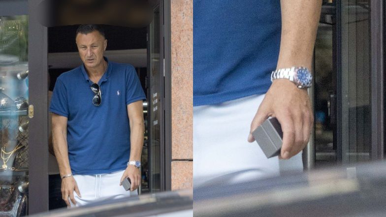 Tomasz Hajto delektuje się papierosem przed lombardem