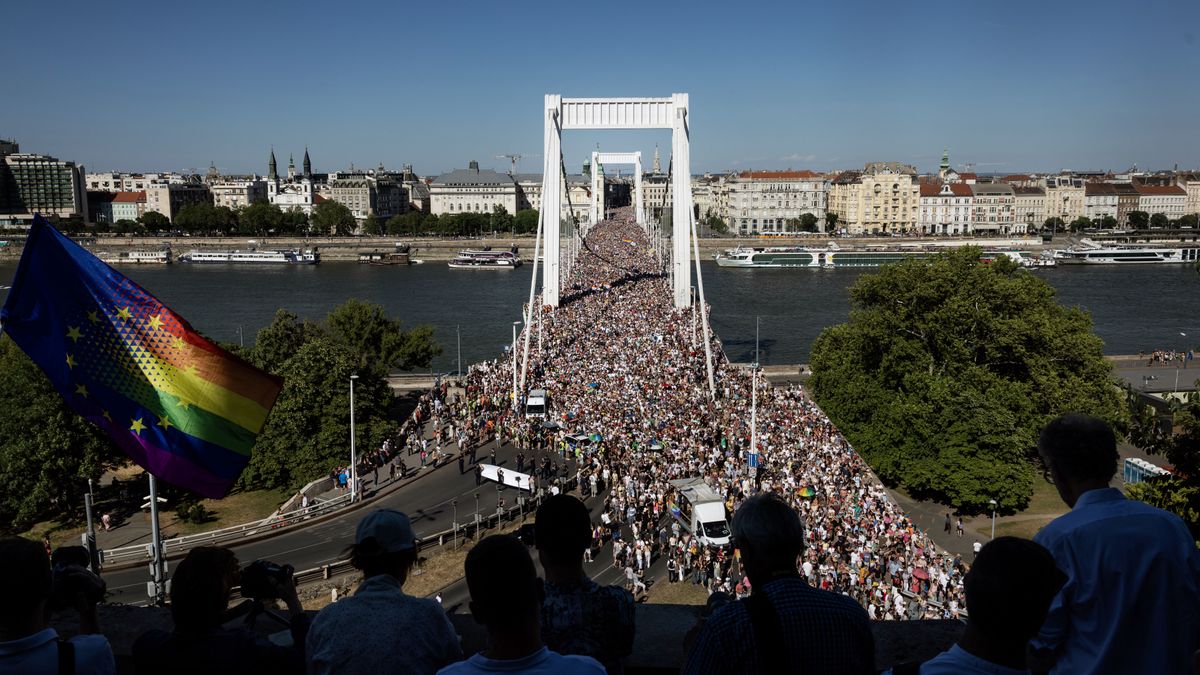 BUDAPEST, HUNGARY - JUNE 28: Participants cross the  Elisabeth Bridge during the Budapest Pride on June 28, 2025 in Budapest, Hungary. Early in 2025, Hungary passed a law restricting the freedom of assembly by connecting it to a previous law from 2021 prohibiting the public portrayal to children of 'divergence from self-identity corresponding to sex at birth, sex change or homosexuality'. Consequently, events such as Pride marches are illegal in the country. The LGBTQ+ community are defying the ban and holding their Pride event on the streets of Budapest. (Photo by Janos Kummer/Getty Images)