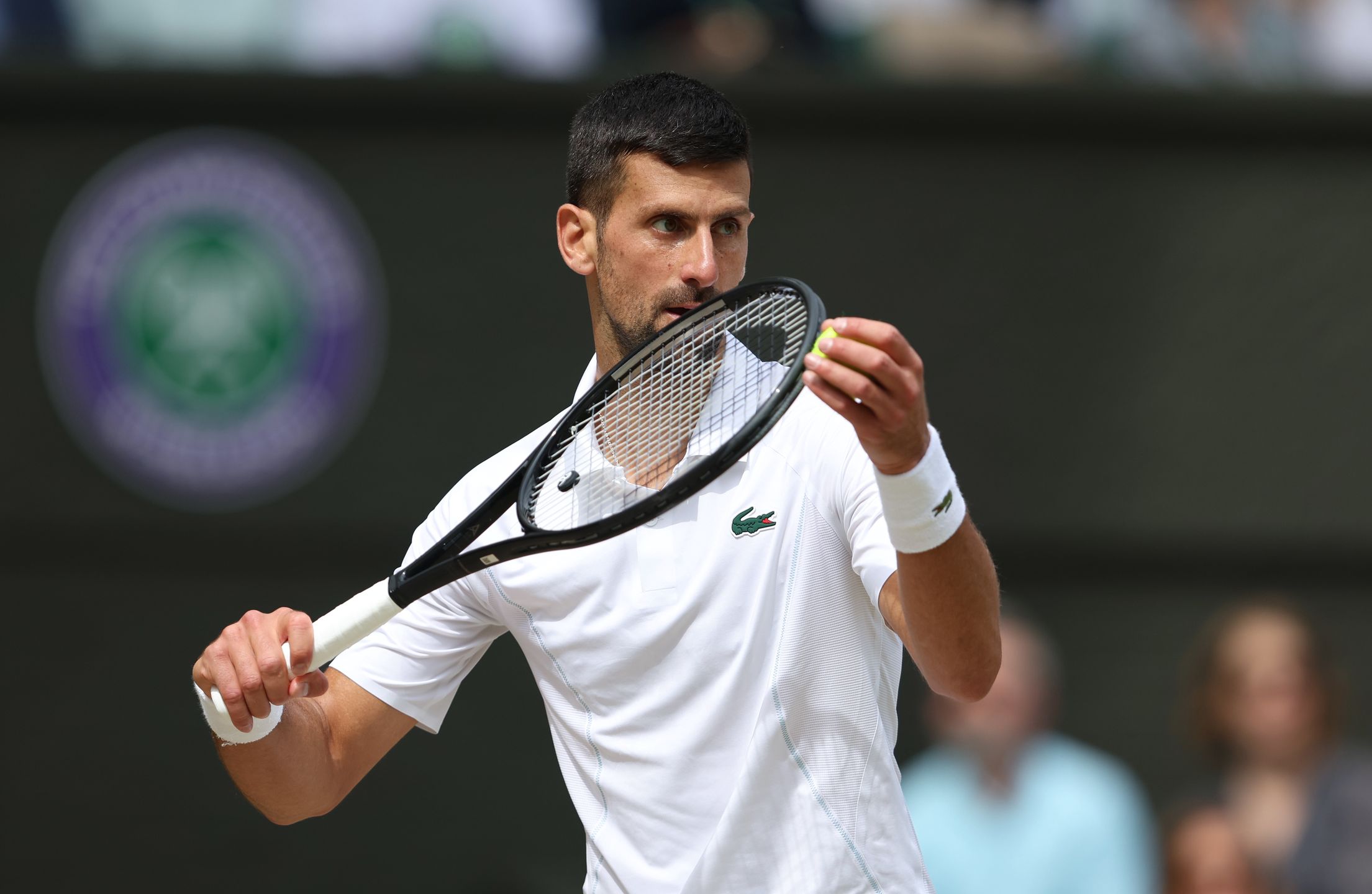 LONDON, ENGLAND - JULY 14: Novak Djokovic (SRB) during his Gentlemen's Singles Final match against Carlos Alcaraz (ESP) during day fourteen of The Championships Wimbledon 2024 at All England Lawn Tennis and Croquet Club on July 14, 2024 in London, England. (Photo by Rob Newell - CameraSport via Getty Images)