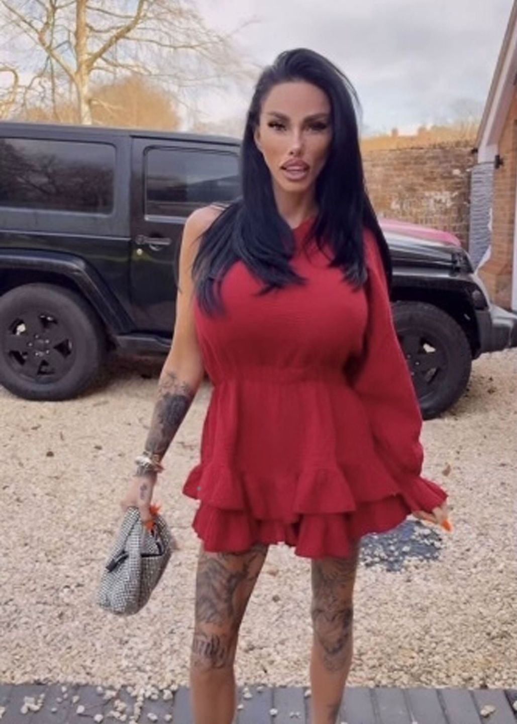 Katie Price jako "lady in red"