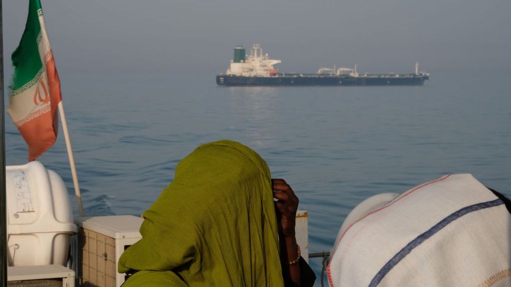 The Persian Gulf Islands
HORMUZ ISLAND, IRAN - MAY 2, 2017: Foreign tourists in veils seen on a passenger boat with the Iranian flag amass in the waters of Strait of Hormuz on May 2, 2017 near Hormuz Island, Iran. An oil tanker is seen on the move in the background. (Photo by Kaveh Kazemi/Getty Images)
Kaveh Kazemi