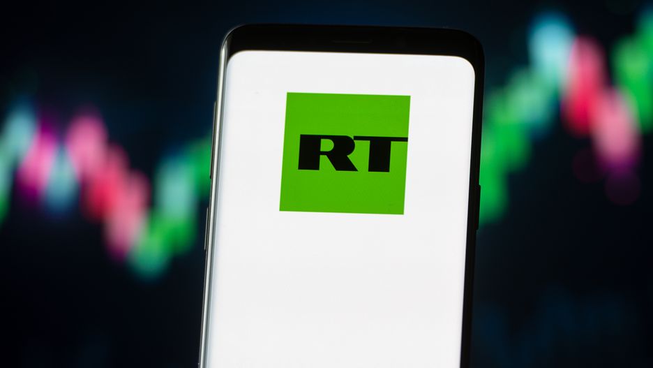 POLAND - 2020/11/04: In this photo illustration a Russia Today RT logo seen displayed on a smartphone. (Photo Illustration by Mateusz Slodkowski/SOPA Images/LightRocket via Getty Images)