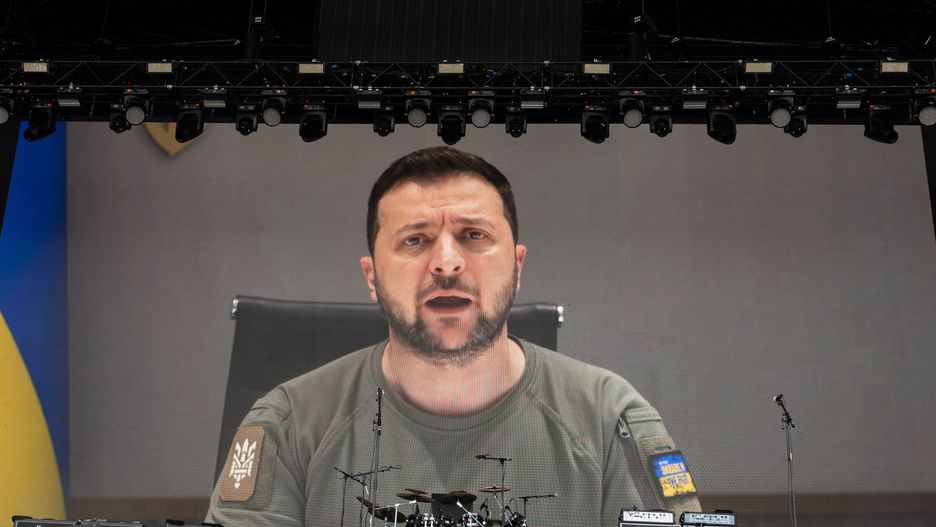 GLASTONBURY, ENGLAND - JUNE 24: Ukrainian President Volodymyr Zelenskyy gives a video message on The Other Stage during day three of Glastonbury Festival at Worthy Farm, Pilton on June 24, 2022 in Glastonbury, England. (Photo by Harry Durrant/Getty Images)