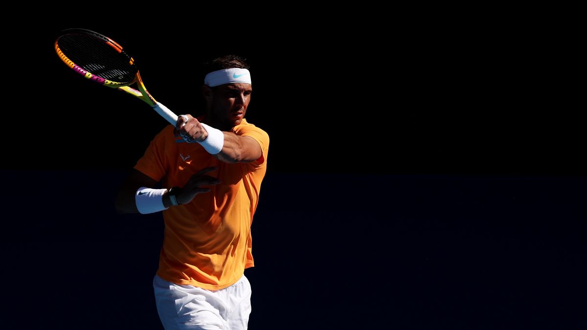 MELBOURNE, AUSTRALIA - JANUARY 16: Rafael Nadal of Spain plays a forehand in their round one singles match against Jack Draper of Great Britain during day one of the 2023 Australian Open at Melbourne Park on January 16, 2023 in Melbourne, Australia. . (Photo by Clive Brunskill/Getty Images)
