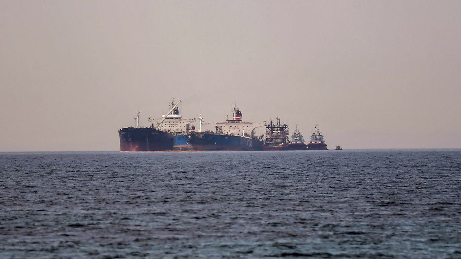 Temporary
The Liberian-flagged oil tanker Ice Energy (L) transfers crude oil from the Iranian-flagged oil tanker Lana (R) (former Pegas), off the shore of Karystos, on the Island of Evia, on May 29, 2022. - Greece will send Iranian oil from a seized Russian-flagged tanker to the United States at the request of the US judiciary, Greek port police said Wednesday, a decision that angered Tehran. Last month the Greek authorities seized the Pegas, which was said to have been heading to the Marmara terminal in Turkey. The authorities seized the ship in accordance with EU sanctions introduced after Russia invaded Ukraine in February. (Photo by Angelos Tzortzinis / AFP)
ANGELOS TZORTZINIS