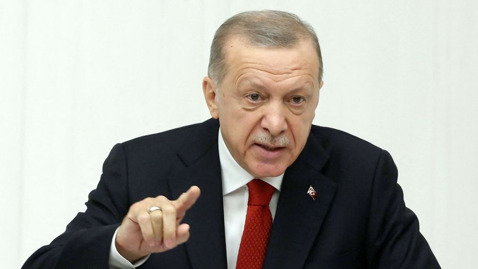 TemporaryTurkish President Recep Tayyip Erdogan addresses the parliament to mark the opening of the new legislative year, at the Grand National Assembly of Turkey in Ankara, on October 1, 2022. - President Recep Tayyip Erdogan on October 1, 2022 warned Turkey would not ratify the NATO membership bids of Sweden and Finland until the two Nordic countries "kept" promises they had made to Ankara. (Photo by Adem ALTAN / AFP)ADEM ALTAN
