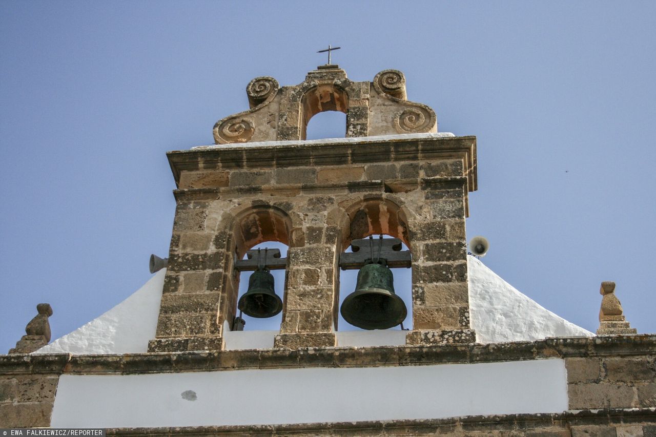 An elderly man was rescued ringing church bells at midnight after being locked inside