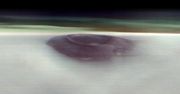 NASA pokazała wulkan na Marsie. Przebija się przez pas chmur lodowych