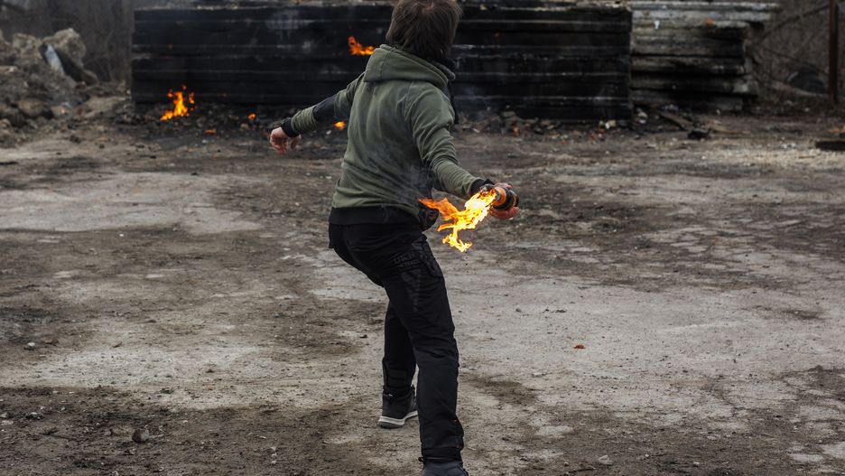 LVIV, UKRAINE - MARCH 08: Civilians make molotov cocktails and training amid Russian attacks in Lviv, Ukraine on March 08, 2022. (Photo by Alejandro Martinez/Anadolu Agency via Getty Images)