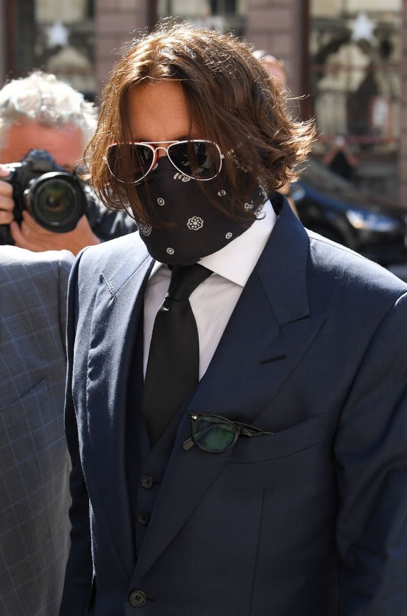 Johnny Depp i Amber Heard zmierzają na rozprawę