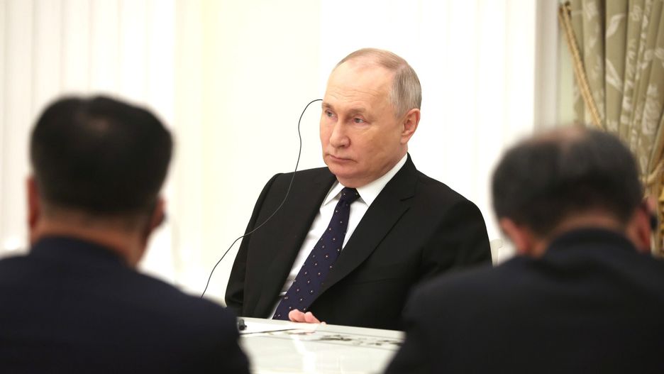 MOSCOW, RUSSIA - FEBRUARY 22: (----EDITORIAL USE ONLY - MANDATORY CREDIT - 'KREMLIN PRESS OFFICE / HANDOUT' - NO MARKETING NO ADVERTISING CAMPAIGNS - DISTRIBUTED AS A SERVICE TO CLIENTS----) Russian President Vladimir Putin and Chinese Foreign Minister Vang Yi meet on February 22, 2023, in Moscow, Russia. (Photo by Kremlin Press Office/Handout/Anadolu Agency via Getty Images)