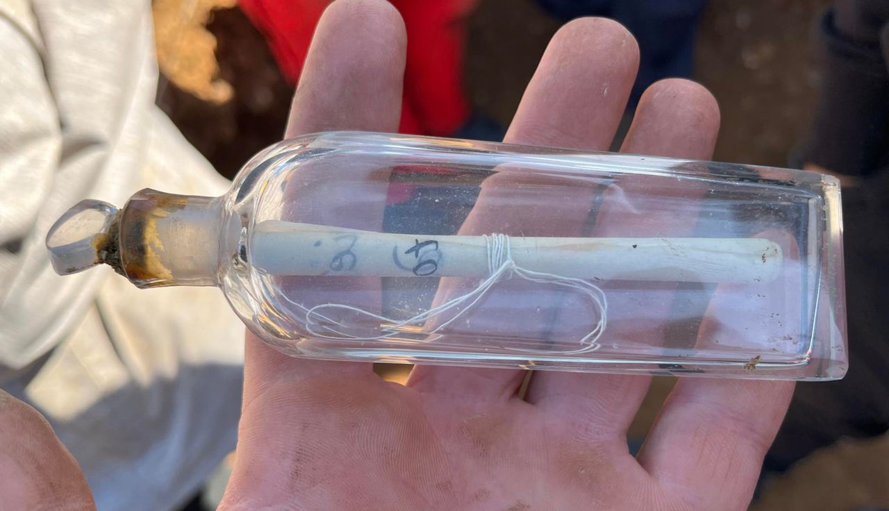 They unearthed an old bottle. What was inside?