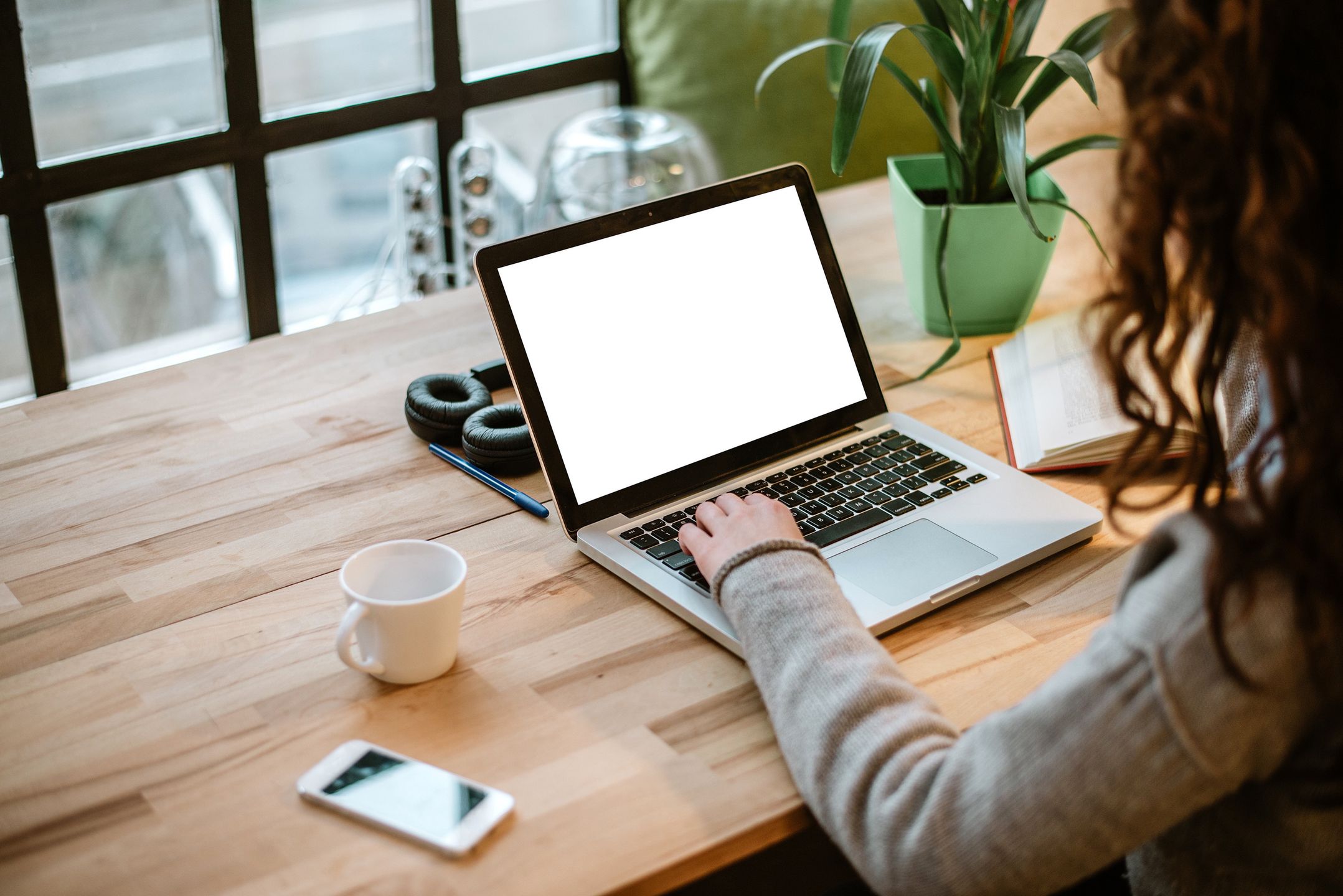 Woman working on laptop with white screen in modern office.
laptop, computer, screen, white, desk, woman, office, business, using, work, table, hand, people, modern, view, technology, internet, blank, background, notebook, phone, person, home, top, rear, back, keyboard, working, desktop, closeup, female, typing, young, job, businesswoman, portable, mobile, hands, concept, girl, pc, communication, casual