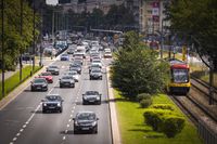 Traffic and a tram are seen on Independence Avenue in Warsaw, Poland on July 27, 2020. Daily cases in Poland increased by over a thousand in just two days over the weekend. In the last months new cases hovered around 300 per day. Warm weather has seen people go to public hotspots on the coast and in the mountains without masks or social distancing. (Photo by Jaap Arriens/NurPhoto via Getty Images)