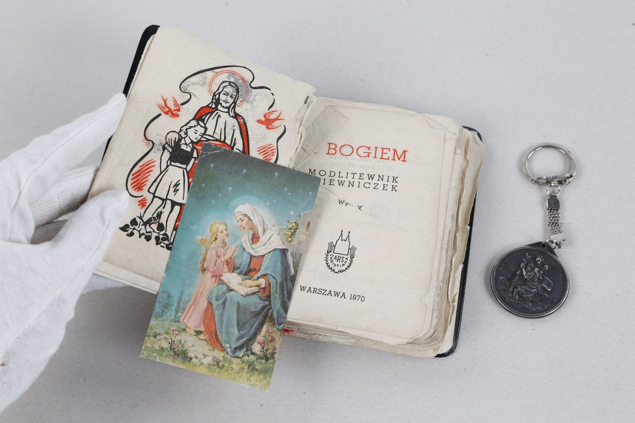 Modlitewnik i brelok ze św. Krzysztofem Grzegorza Sudwoja