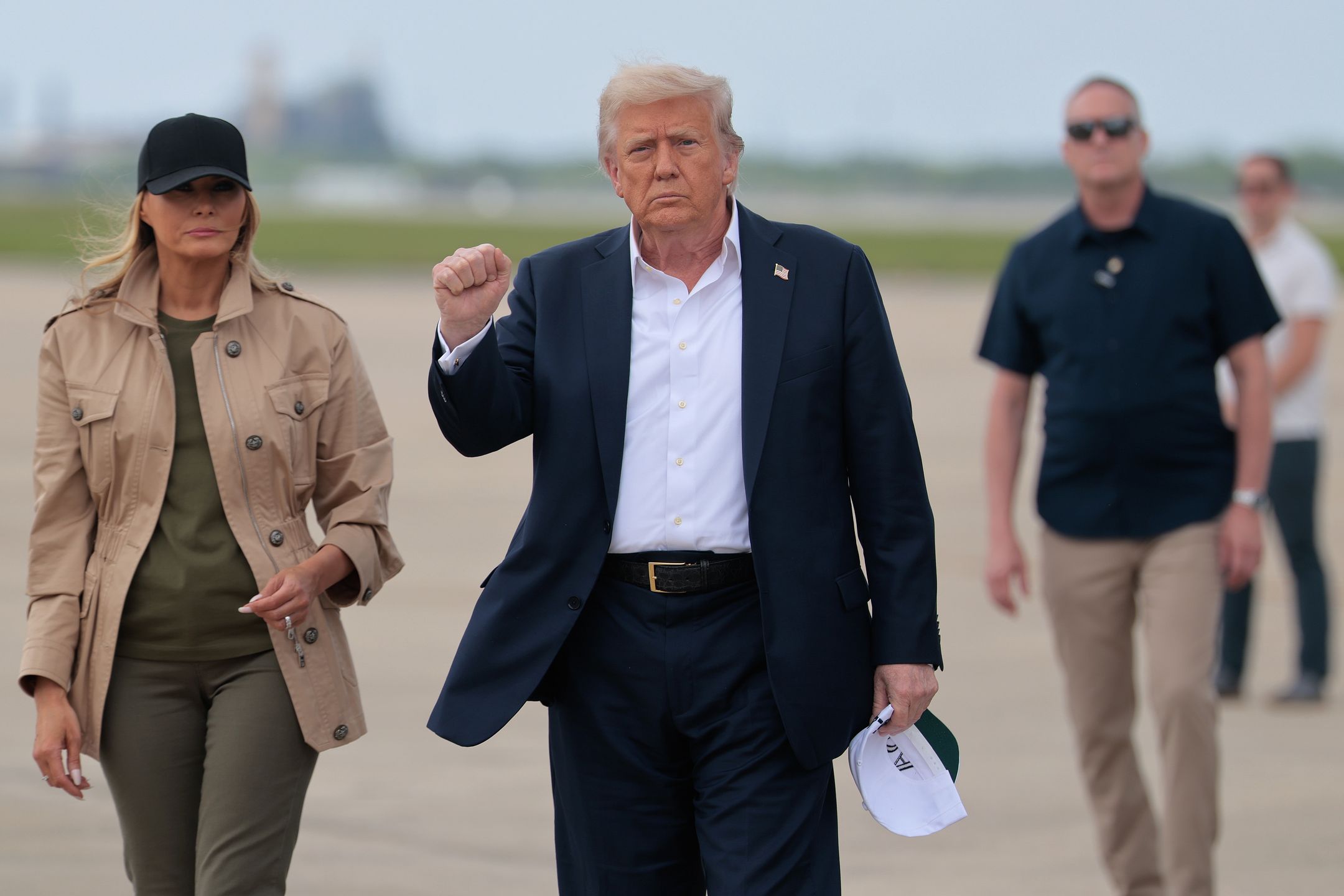 SAN ANTONIO, TEXAS - JULY 11: President Donald Trump and first lady Melania Trump arrive at Lackland Air Force Base to survey damage and meet with first responders and victims of last week's flash flooding on July 11, 2025 in San Antonio, Texas. Trump traveled to Texas one week after flash flooding along the Guadalupe River swept through cities, mobile home parks and summer camps, killing 120 people. Ninety-six of those killed were in Kerr County, where the toll includes at least 36 children. (Photo by Chip Somodevilla/Getty Images)