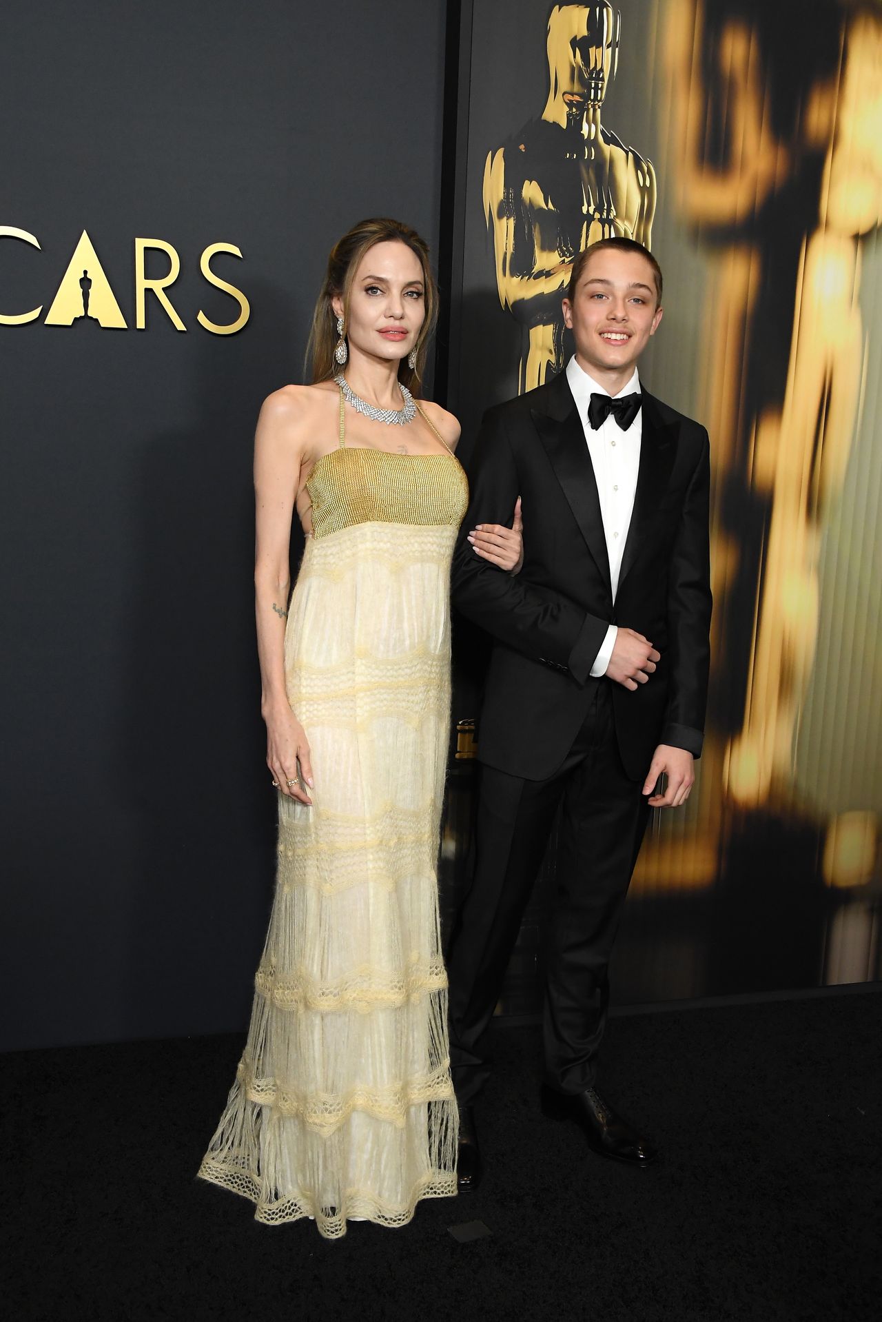 HOLLYWOOD, CALIFORNIA - NOVEMBER 17: Angelina Jolie and Knox Jolie-Pitt arrives at the 2024 Governors Awards at Dolby Theatre on November 17, 2024 in Hollywood, California.  (Photo by Steve Granitz/FilmMagic)