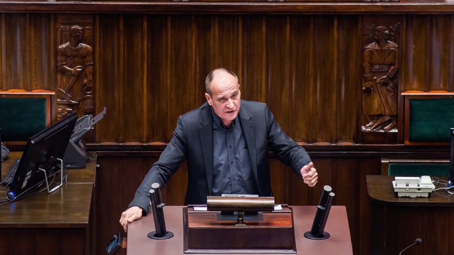 WARSAW, MASOVIAN VOIVODESHIP, POLAND - 2023/12/11: Pawel Kukiz, Member of the Parliament speaks during the session of the Lower House of Parliament. Poland's parliament voted for Donald Tusk as the new prime minister, with 248 MPs supporting him and 201 against. Tusk, known in Europe, was prime minister from 2007 to 2014 and led the European Council and the center-right European People's Party. After Poland's recent election where opposition parties won the most seats, Mateusz Morawiecki's conservative government lost a vote of confidence. This allows Donald Tusk's coalition to take over this week, ending eight years of the Law and Justice (PiS) party's rule. (Photo by Attila Husejnow/SOPA Images/LightRocket via Getty Images)