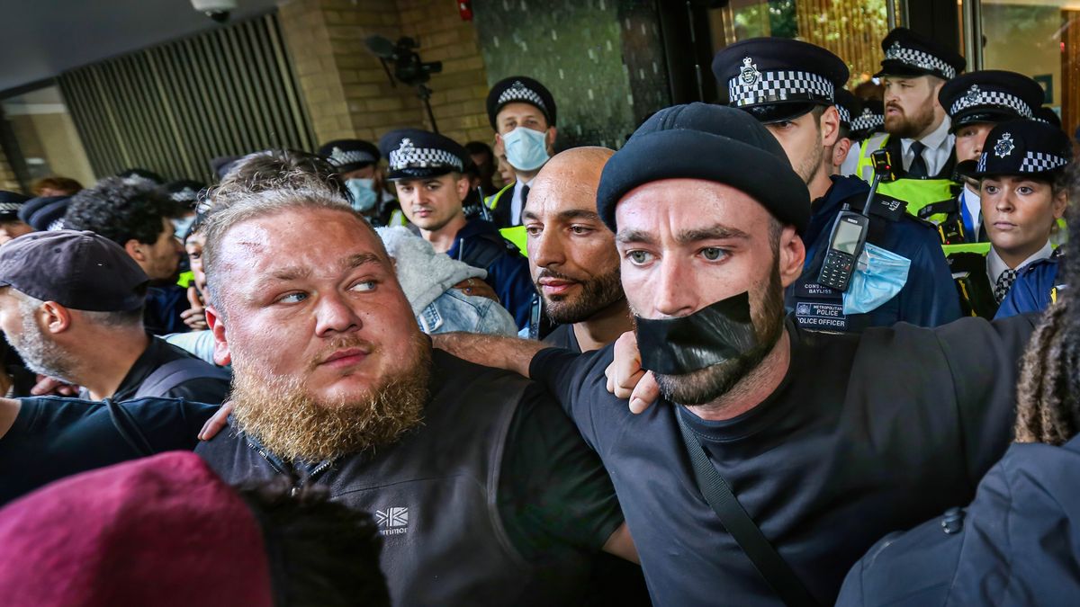 Actor Sean Ward with a black tape over his mouth takes partLONDON, UNITED KINGDOM - 2021/08/09: Actor Sean Ward with a black tape over his mouth takes part during the demonstration.Protesters held a demonstration against the mainstream media bias, covid restrictions, vaccine passports, Covid vaccination for children and the loss of freedom under the Coronavirus Act. (Photo by Martin Pope/SOPA Images/LightRocket via Getty Images)SOPA Imagesanti vaccination, black tape, covid restrictions, demo, demonstration, demonstrator, demonstrators, media bias, protester, protesters, rally, sean ward, vaccine passports, anti vaxxers, anti vax