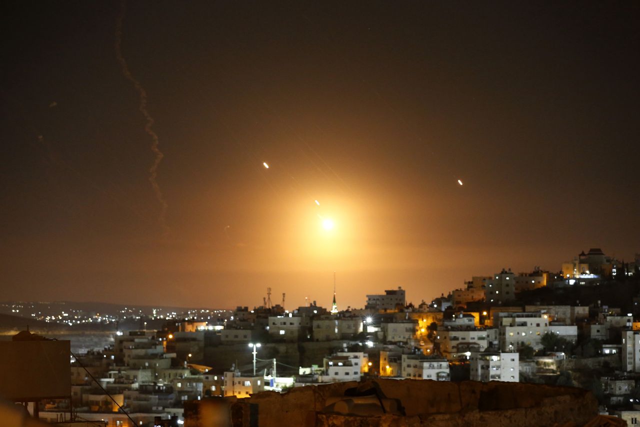 According to the Israel Defense Forces, 180 rockets were fired towards the country, of which "many" were intercepted by Israeli and American air defense systems (Photo by Wisam Hashlamoun/Anadolu via Getty Images)