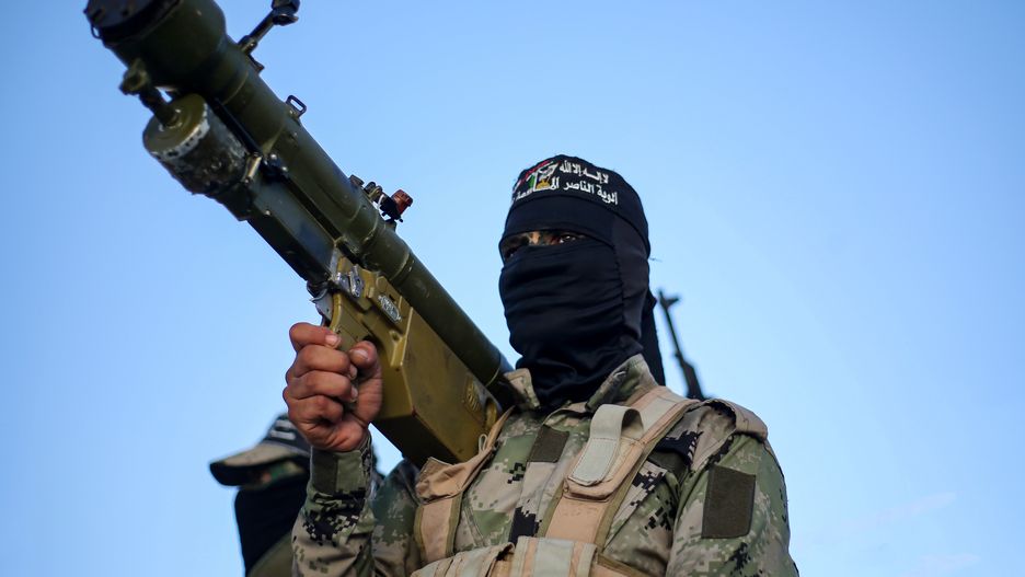 GAZA, PALESTINE - 2023/09/29: A fighter from the Nasser Salah al-Din Brigades carries a Kornet missile, during an anti-Israel military parade in Khan Yunis, south of the Gaza Strip. (Photo by Yousef Masoud/SOPA Images/LightRocket via Getty Images)
