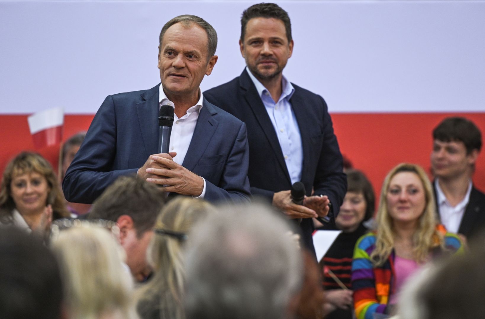 KRAKOW, POLAND - MAY 15, 2023: , Leader of the Civic Platform opposition party, Donald Tusk, and Mayor of Warsaw, Rafal Trzaskowski, unite in Krakow, sharing vision for Poland's progress, on May 15, 2023, in Krakow, Poland.
Chairman Donald Tusk's visit to Krakow marked the 10th stop of the Civic Platform party's tour. The 'Tusk Show' united residents for the #HereIsTheFuture campaign, featuring a mix of familiar and new elements. The dynamic exchange and passionate speeches echoed the March 4th march, rallying all to unite in Warsaw. (Photo by Artur Widak/NurPhoto via Getty Images)