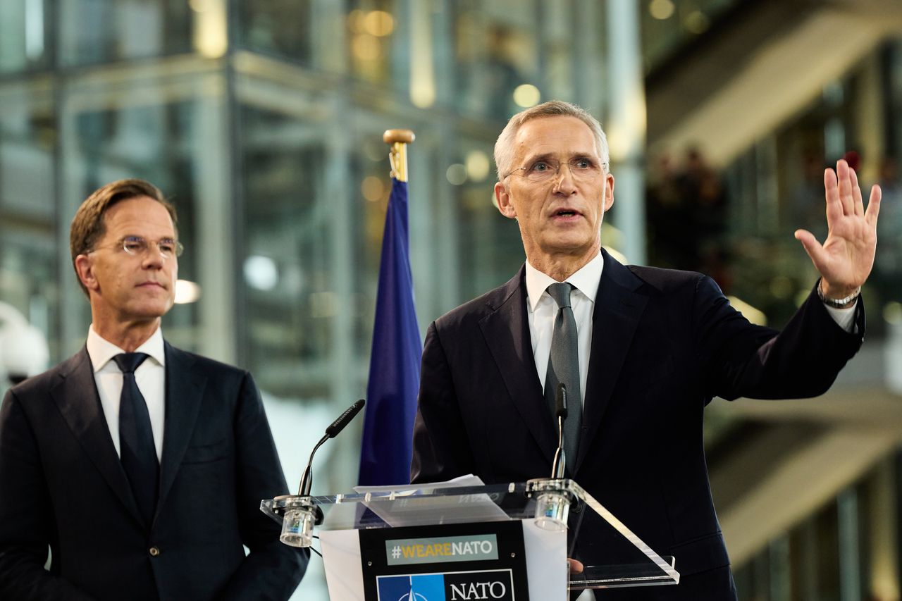 Jens Stoltenberg, outgoing secretary general of the North Atlantic Treaty Organization (NATO), right, and Mark Rutte, incoming secretary general of the North Atlantic Treaty Organization (NATO), during a transition ceremony at the NATO headquarters in Brussels, Belgium, on Tuesday, Oct. 1, 2024. Mark Rutte, the affable and meticulousformer Dutch premier, has a daunting task ahead to keep the defense alliance a global force. Photographer: Ksenia Kuleshova/Bloomberg via Getty Images