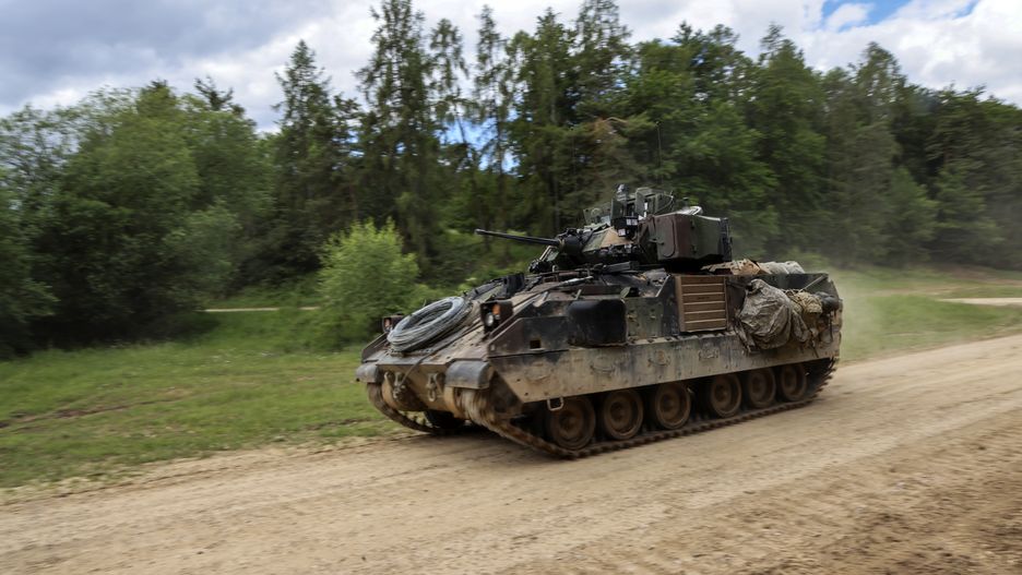 A US Army M2 Bradley infantry fighting vehicle during the Combined Resolve 17 multinational training exercise, with participating forces from Belgium, Bosnia, Czech Republic, Estonia, Greece, Italy, Kosovo, Moldova, North Macedonia, Poland and US, at the Hohenfels Training Area in Hohenfels, Germany, on Wednesday, June 8, 2022. Combined Resolve is a multinational exercise conducted at the Joint Multinational Readiness Center, designed to test and certify brigade combat teams, as well as build interoperability with US allies and partners. Photographer: Alex Kraus/Bloomberg via Getty Images