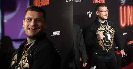Popek w łańcuchu wygłupia się na ściance