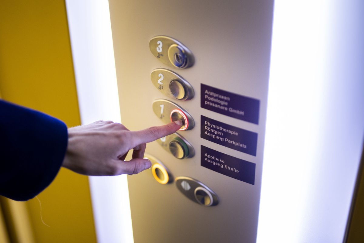 MIROW, GERMANY - OCTOBER 21: In this photo illustration a hand is pressing a button in an elevator on October 21, 2021 in Mirow, Germany. (Photo Illustration by Ute Grabowsky/Getty Images)