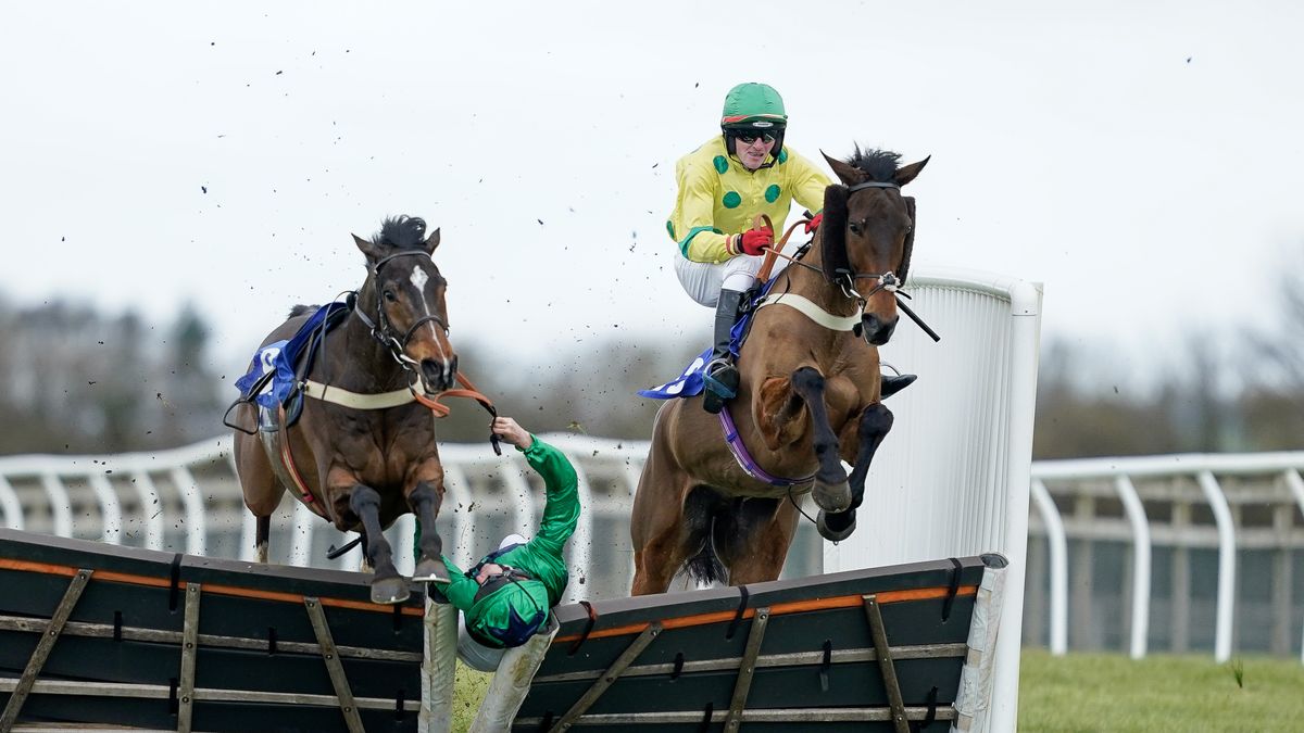 Wincanton Races
WINCANTON, ENGLAND - FEBRUARY 02: Freddie Gordon riding Sami Bear is unseated and dragged through the hurdle at the last when leading during The JenningsBet Witney Handicap Hurdle at Wincanton Racecourse on February 02, 2023 in Wincanton, England. (Photo by Alan Crowhurst/Getty Images)
Alan Crowhurst