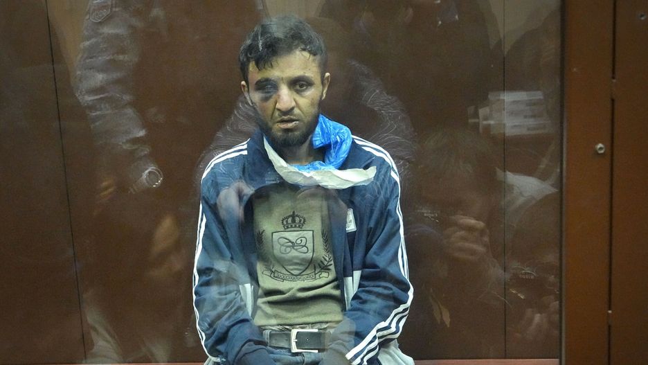Temporary
A suspect in the Crocus City Hall shooting on Friday sits in a courtroom in the Basmanny District Court, in Moscow, Russia, Sunday, March 24, 2024. The four men charged with the massacre at a Moscow theater have been identified by the Russian government as citizens of Tajikistan, some of the thousands who migrate each year from the poorest of the former Soviet republics to scrape out marginal existences. (AP Photo/Alexander Zemlianichenko)
Alexander Zemlianichenko