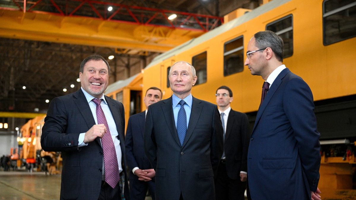 TULA, RUSSIA - APRIL 04: (----EDITORIAL USE ONLY - MANDATORY CREDIT - 'KREMLIN PRESS OFFICE / HANDOUT' - NO MARKETING NO ADVERTISING CAMPAIGNS - DISTRIBUTED AS A SERVICE TO CLIENTS----) Russian President Vladimir Putin (C) inspects at facility of Tulazheldormash (Tula Railway Engineering Plant), manufacturer of heavy track equipment and equipment for the construction, renovation and maintenance of railway tracks, in Tula, Russia, on April 04, 2023. (Photo by Kremlin Press Office / Handout/Anadolu Agency via Getty Images)